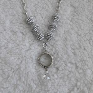 Silver locket style necklace